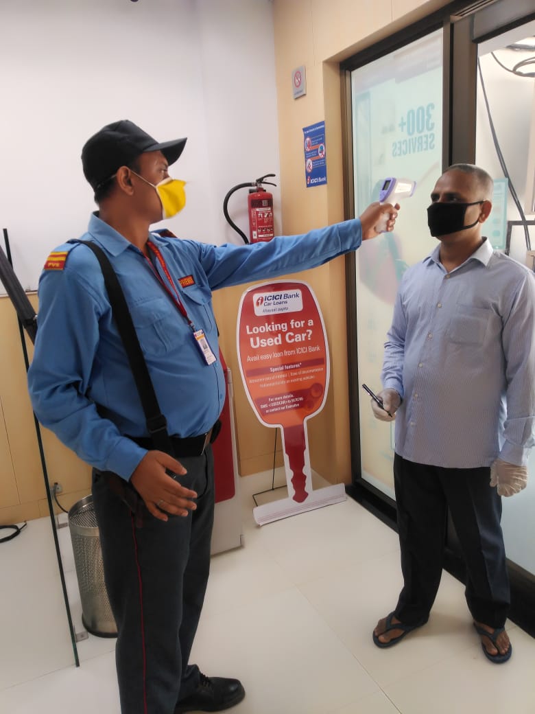 temperature check by a pvs personnel